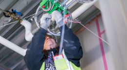 Electrician at Clinic / UH working in ceiling wiring