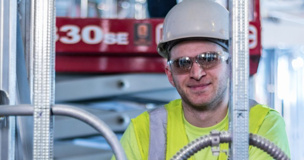 Image of local electrician in safety gear